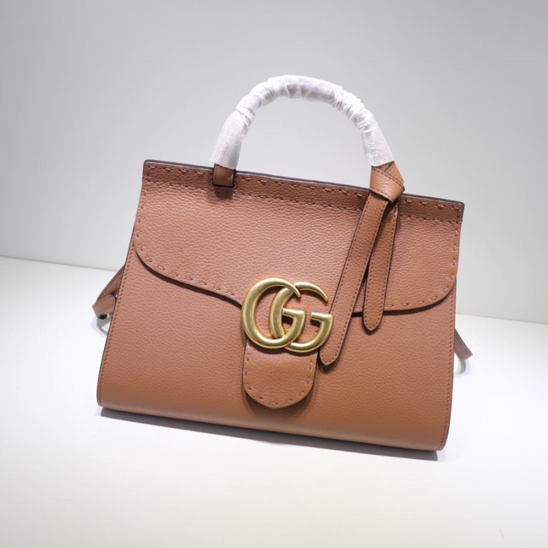 G*u*i top handle bags